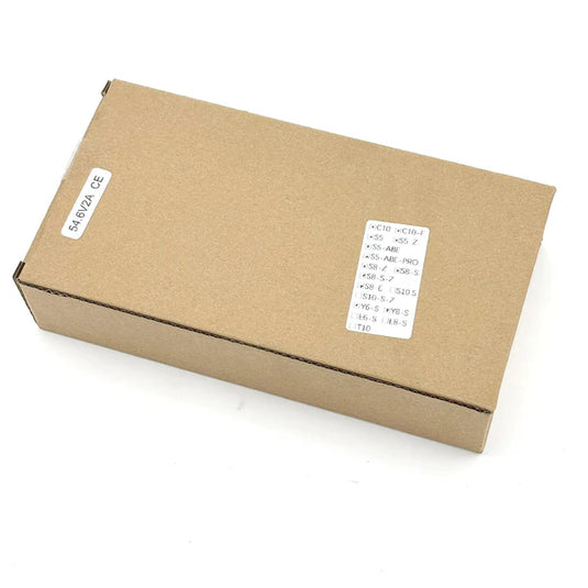 Brown cardboard box with labels on a white background