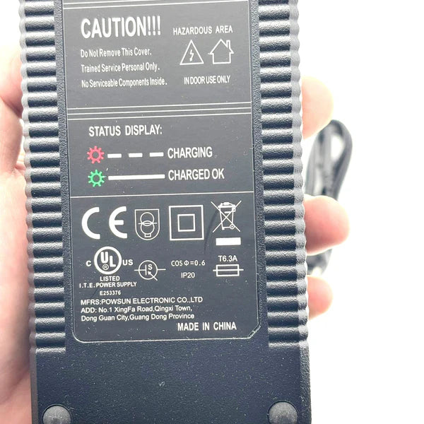 Cargar imagen en el visor de la Galería, Black electronic device with text and symbols on a white background

