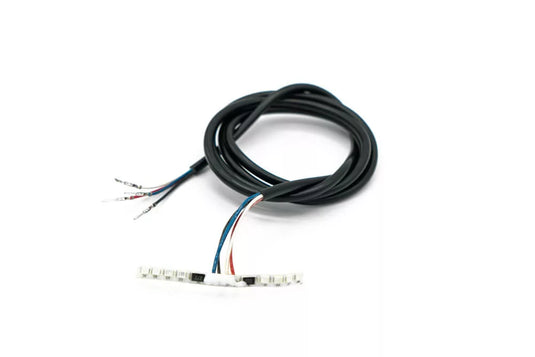 A black rear light with wiring for an electric scooter.
